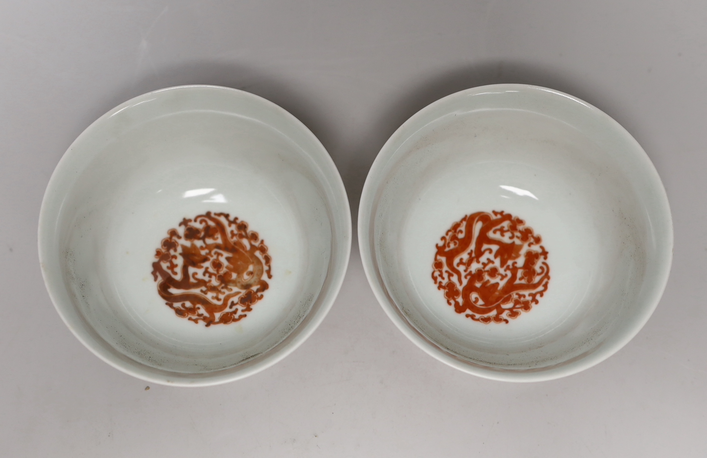 A pair of Chinese iron-red enamelled bowls, 11.5cm diameter